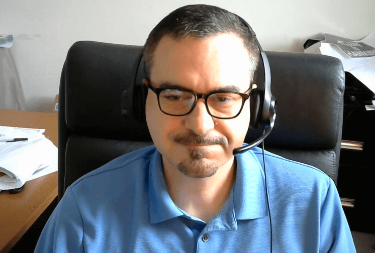 Joe Sego sits at his desk and explains how he sped up class registrations by 50% with SimpleTexting’s SMS service.